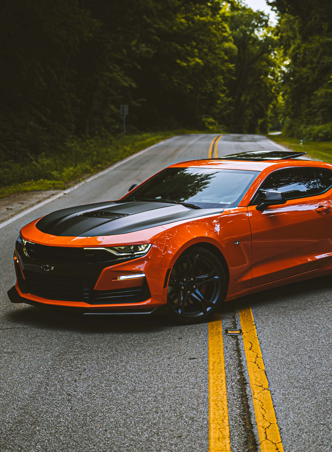 Orange car on a remote road
